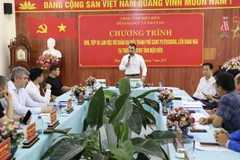 At the working session (Photo: VNA)