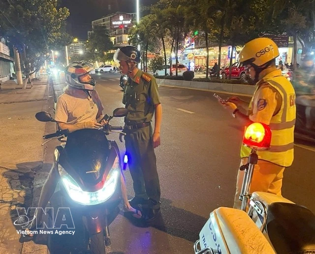 Vietnam could tighten local oversight of foreigners as arrivals hit record highs