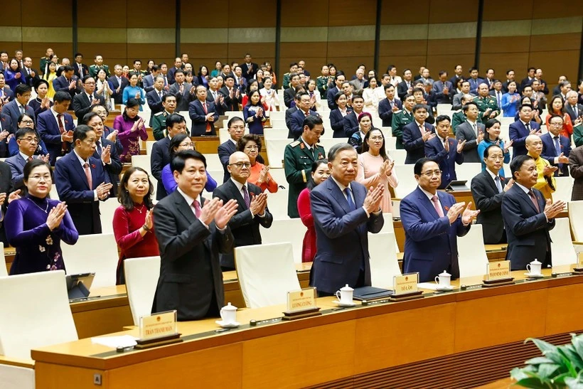 Party General Secretary To Lam (second from left), other high-ranking Party and State leaders, and NA deputies attend the closing session of the 15th NA's 10th session (Photo: VNA)