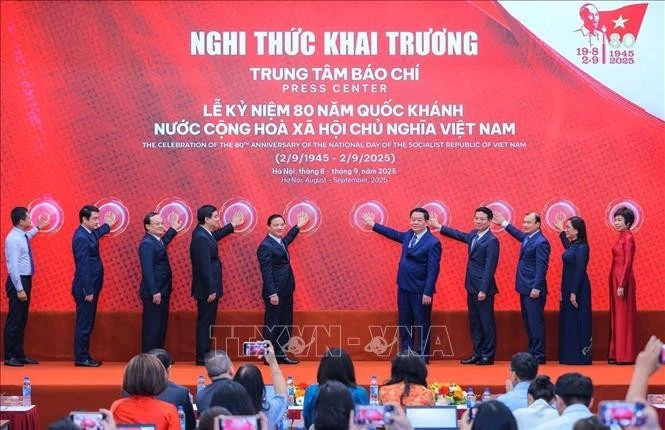 Participants at the inauguration ceremony of the press centre in Ha Noi on August 26. (Photo: VNA)