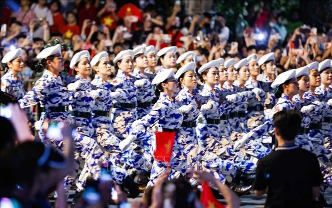 Military medical formation passes Nguyen Thai Hoc Street during the rehearsal in Ha Noi on August 21. (Photo: VNA)