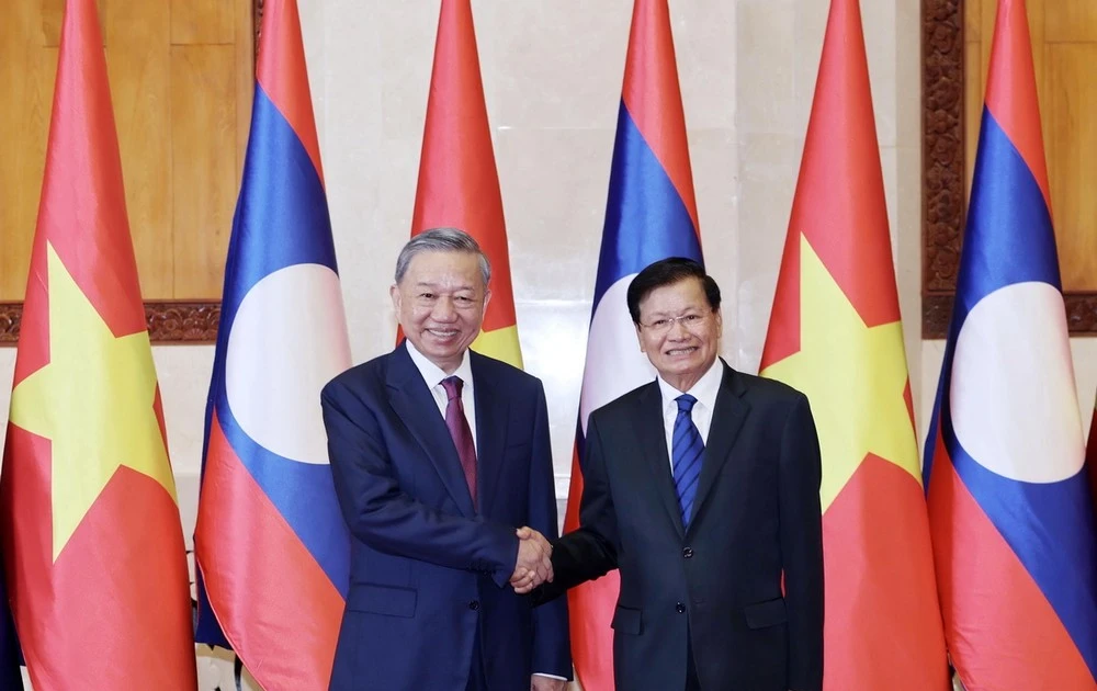 Top leaders of Vietnam and Laos hold talks in Hanoi | Vietnam+ ...