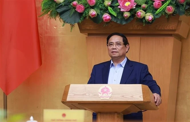 Prime Minister Pham Minh Chinh concludes the Government's meeting on October 5. (Photo: VNA)