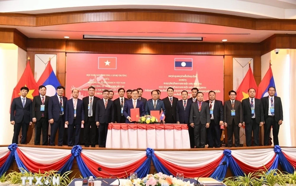 Delegates at the ministerial-level bilateral conference between the Ministries of Public Security of Vietnam and Laos on December 6, 2025 (Photo: VNA)