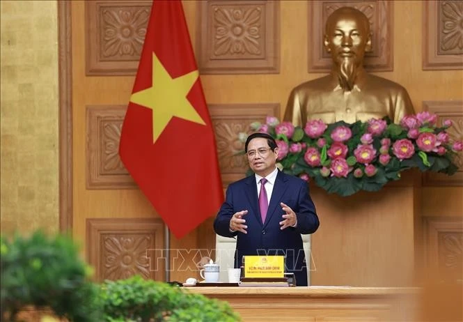 PM Pham Minh Chinh speaks at the reception (Photo: VNA)