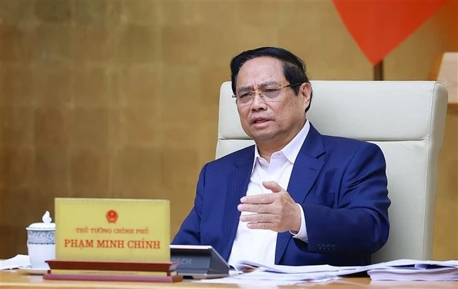 PM Pham Minh Chinh speaks at the Government meeting on December 6. (Photo: VNA)