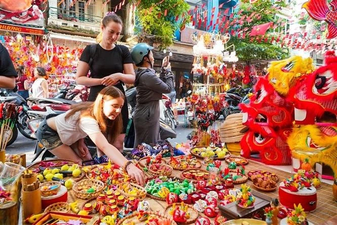 Shopkeepers report that demand has shifted towards eco-friendly, safe, locally made toys (Photo: VNA)
