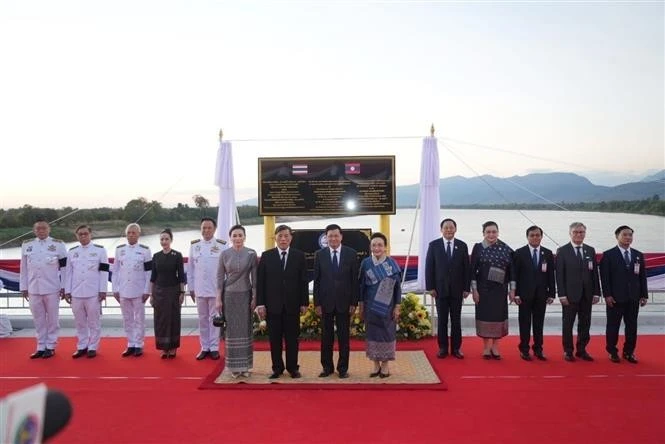 Delegates at the inauguration of the fifth Laos–Thailand Friendship Bridge on December 26. (Photo: VNA)