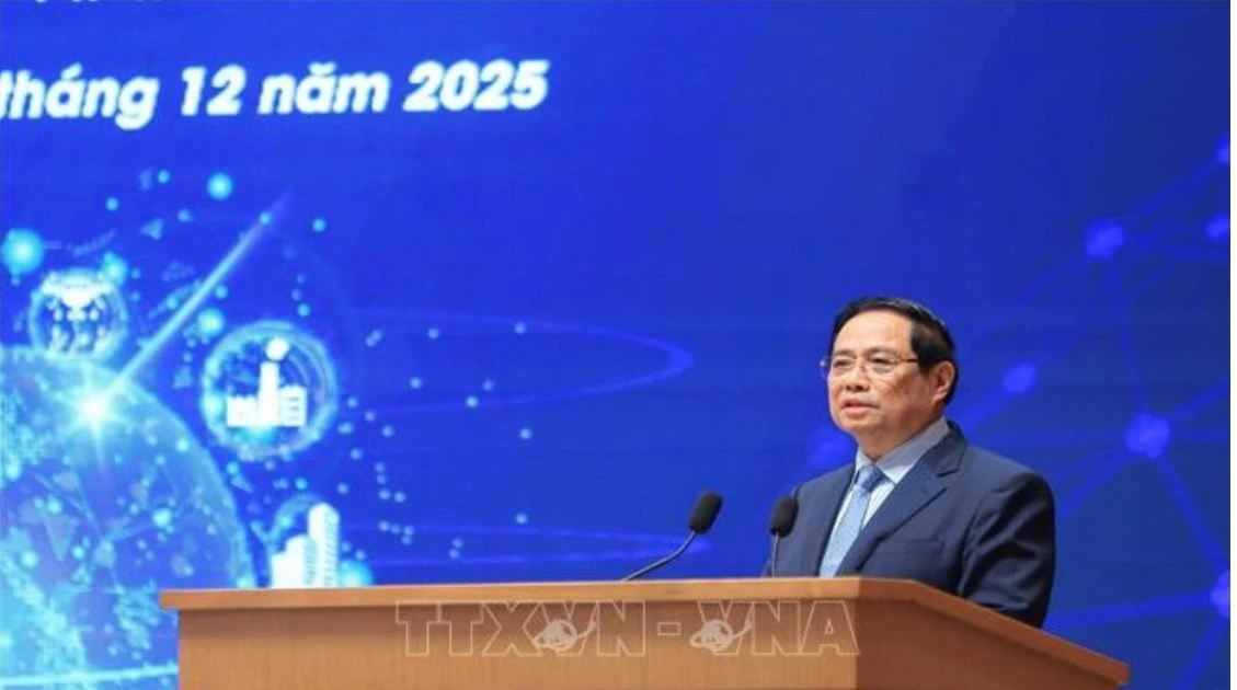 Prime Minister Pham Minh Chinh addresses the third National Forum on Digital Economy and Digital Society in Ha Noi on December 20. (Photo: VNA)