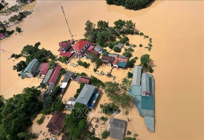 A heavily-flooded residential area in Yen Binh commune, Lang Son province (Photo: VNA)