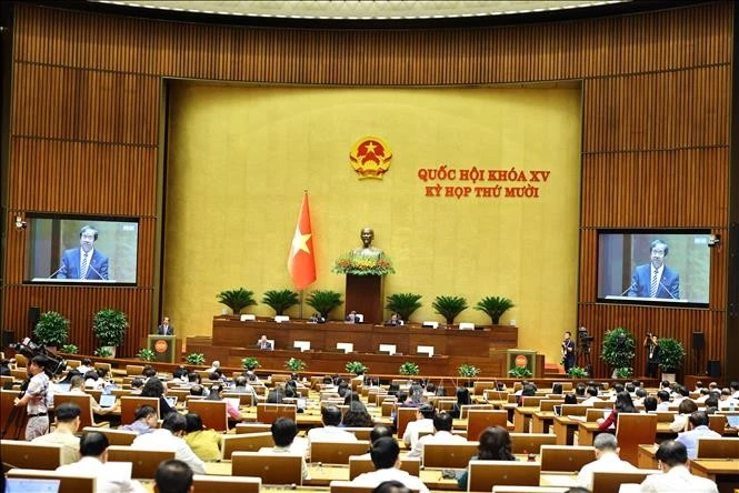 Deputies on October 22 morning listen to proposals and verification reports on three draft laws concerning the education sector. (Photo: VNA) 