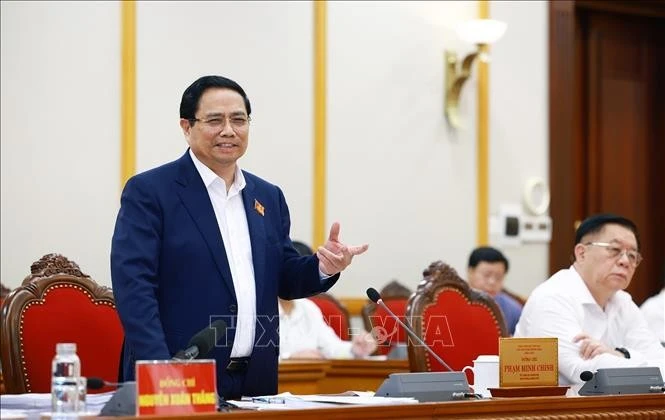 Prime Minister Pham Minh Chinh at the working session with the Standing Board of the Thanh Hoa Party Committee on August 2, 2025. (Photo: VNA)