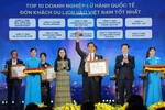 Top ten travel firms are honoured at the awards presentation ceremony on September 27. (Photo: VNA)
