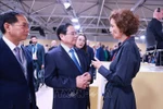 Prime Minister Pham Minh Chinh (centre) meets with UNESCO Director-General Audrey Azoulay on June 9. (Photo: VNA)