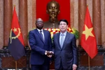 President Luong Cuong (R) receives Angolan Ambassador to Vietnam Fernando Miguel in April 2025. (Photo: VNA)