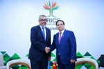 PM meets leaders of WHO, AIIB in Brazil
