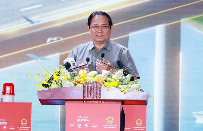 Prime Minister Pham Minh Chinh speaks at the groundbreaking ceremony for the Ninh Binh–Hai Phong Expressway Project’s section passing through Nam Dinh and Thai Binh provinces. (Photo: VNA) pham-minh-chinh-2.jpg