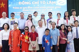 Party chief visits two schools for students with disabilities in Hanoi