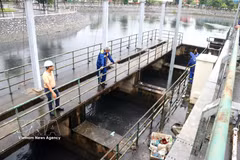 Hai Phong's company runs a water drainage system (Photo: VNA)