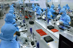 A production line of camera modules and electronic components for export at the factory of MCNEX VINA Co., Ltd of the Republic of Korea in Phuc Son Industrial Park, Ninh Binh province. (Photo: VNA)