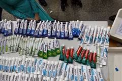 The tubes of toothpaste containing drugs seized in the case. (Photo published by VNA)