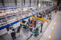 Workers assemble parts on an automotive production line in HCM City. The city’s industrial sector is showing strong signs of recovery. (Photo: moit.gov.vn)