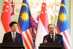 Singaporean and Malaysian PMs Lawrence Wong (L) and Anwar Ibrahim at the press conference. (Photo: AP)