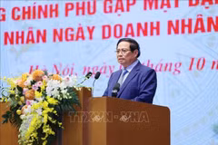Prime Minister Pham Minh Chinh speaks at the meeting with representatives of the business community in Hanoi on October 9 (Photo: VNA)