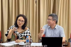 Bagie Sherchand, Director of Strategic Partnerships and Alliances at the National Cooperative Business Association – CLUSA International (left) and Ngo Xuan Nam, Deputy Director of the Vietnam Sanitary and Phytosanitary Notification Authority and Enquiry Point at a working session in Hanoi on June 5. (Photo: VNA)