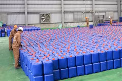 Workers at a Duc Giang Chemical warehouse. — Photo courtesy of the company