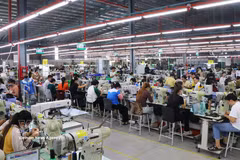 Vietnam's textile - garment and footwear industries are aiming to shift from processing and assembly to stages with higher added value, increasing technology content and competitiveness. (Photo: VNA)