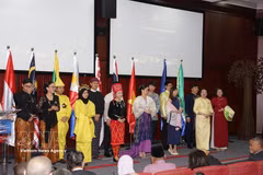 A performance showcasing traditional costumes from ASEAN member states at the anniversary ceremony. (Photo: VNA)