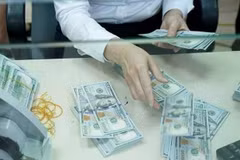 The reference exchange rate is kept unchanged on July 22. (Photo: VNA)