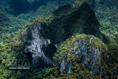 Phong Nha is best known for its dramatic limestone karsts, vast primary forests and spectacular cave systems within the UNESCO-recognised Phong Nha–Ke Bang National Park. (Photo: VNA)