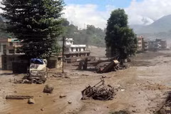 Area devastated by flash floods carrying mud and debris in Rasuwa district, Nepal on August 26 (Photo: ANI/VNA)