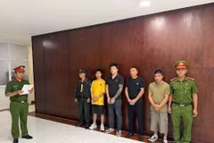 Suspects at the police station (Photo published by VNA)