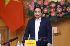 Prime Minister Pham Minh Chinh speaks at a meeting on accelerating Quang Trung Campaign. (Photo: VNA)