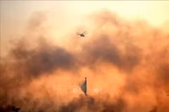 Smoke rises from a land fire in South Sumatra, Indonesia (Photo: Xinhua/VNA)