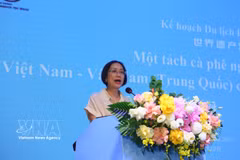 Deputy Director of the Vietnam National Authority of Tourism Phan Linh Chi speaks at the event connecting tourism destinations between Vietnam and Yunnan (China). (Photo: VNA)