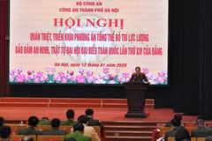 Hanoi Police on January 12 holds a conference to roll out a comprehensive plan for deploying forces to ensure security and public order during the 14th National Party Congress. (Photo: the Hanoi Police)