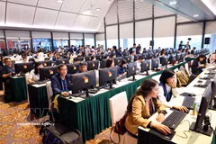 At the press centre for the 14th National Party Congress. (Photo: VNA)