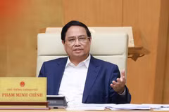 Prime Minister Pham Minh Chinh addresses the Government’s law-making session in Hanoi on July 23. (Photo: VNA)