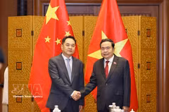 National Assembly President Tran Thanh Man (R) and Yang Wanming, President of the Chinese People’s Association for Friendship with Foreign Countries (Photo: VNA)