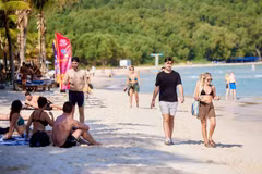 International visitors stroll along Kem Beach in southern Phu Quoc, one of the world's most beautiful beaches. (Photo: Sun Group)
