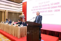 Politburo member, Permanent Deputy Secretary of the Government Party Committee, and Permanent Deputy Prime Minister Nguyen Hoa Binh speaks at the press conference on October 9. (Photo: VNA)