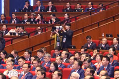 Vietnam News Agency reporters cover the 14th National Party Congress. (Photo: VNA) 