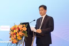 Standing Deputy Minister of Health Vu Manh Ha speaks at a national scientific conference on research and applications in medicine in Hanoi on August 28 (Photo: VietnamPlus)