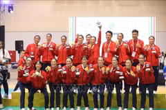 The Vietnamese team win the gold medal in women's handball at the 33rd SEA Games (Photo: VNA)