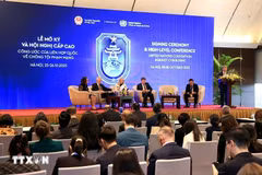 A view of a panel discussion within the framework of the signing ceremony and high-level meeting of the United Nations Convention against Cybercrime. (Photo: VNA)