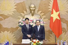 National Assembly Chairman Tran Thanh Man (R) and Director of the Youth Division of Japan’s Liberal Democratic Party (LDP) Nakasone Yasutaka. (Photo: VNA)